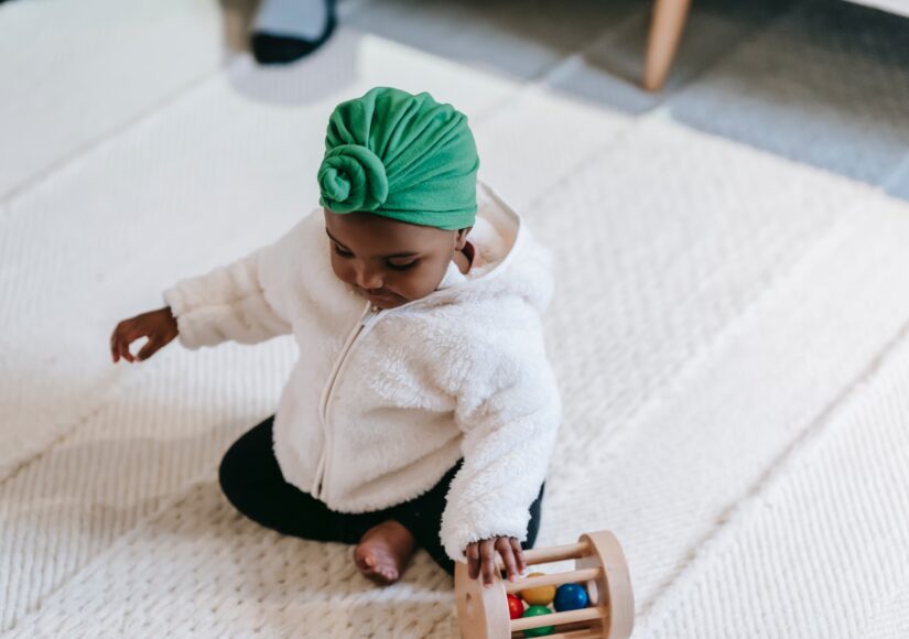 baby playing with toy