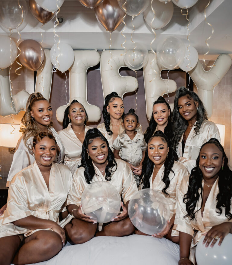 Bridesmaids in gold, satin robes